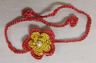 free crochet pattern, free crochet motif pattern, free crochet flower motif pattern, free crochet two layered flower motif pattern, front post single crochet stitch, rakhi pattern, crochet rakhi pattern, kankri yarn, kamal kadai yarn, polyester silk yarn,