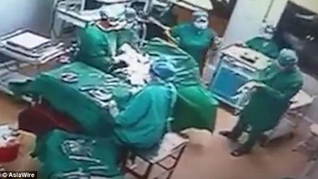 Drama as Doctor Beat the Hell Out of His Nurse Girlfriend in Operating Theatre (Photos+Video)