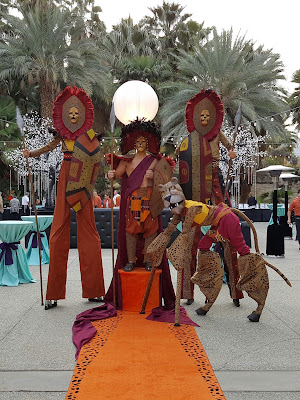 cheetah zoo stilt walkers