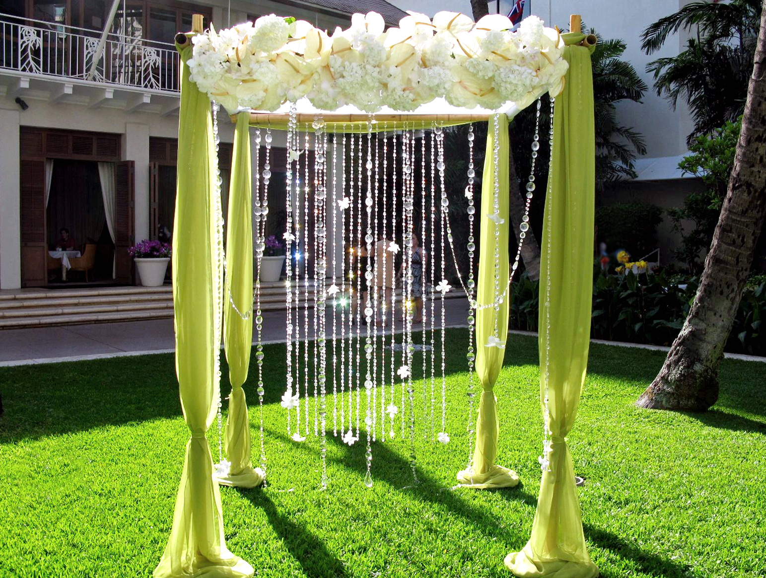 After decorating the poles with wedding color matching fabric, drape 