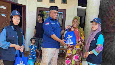 Fungsionaris Nasdem,H.Muslimin Bagikan Sembako ke Warga di Kabupaten Bone