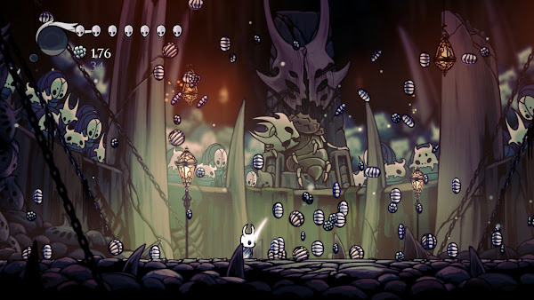 Screen shot, a room full of bugs throw money for the bug knight.