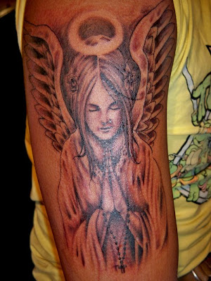 praying angel tattoo. angel praying tattoo. angel