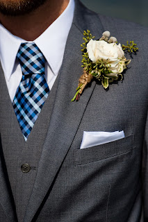 fall boutonniere with berries and twine