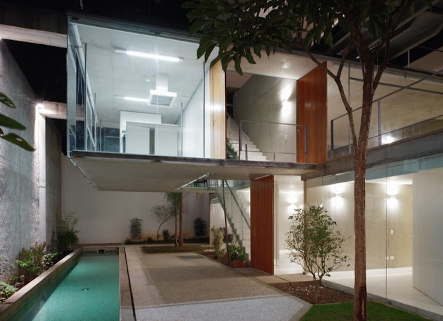 Picture of the house and the entrance as seen at night