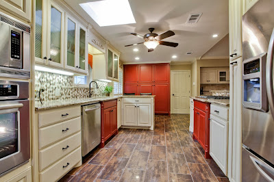 minimalist and simple kitchen with pops of red 