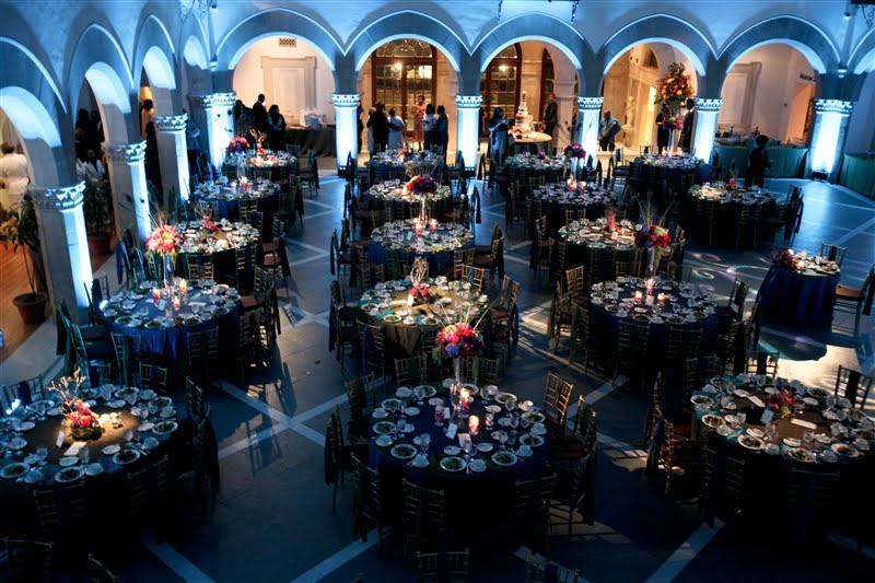 Centerpieces consisted of hydrangea celosia roses and peacock feathers