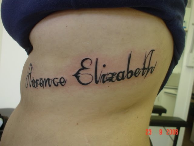 Girl Side Lettering Tattoos Girl Side Lettering Tattoos