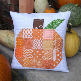 Scrappy patchwork pumpkin quilted pillow