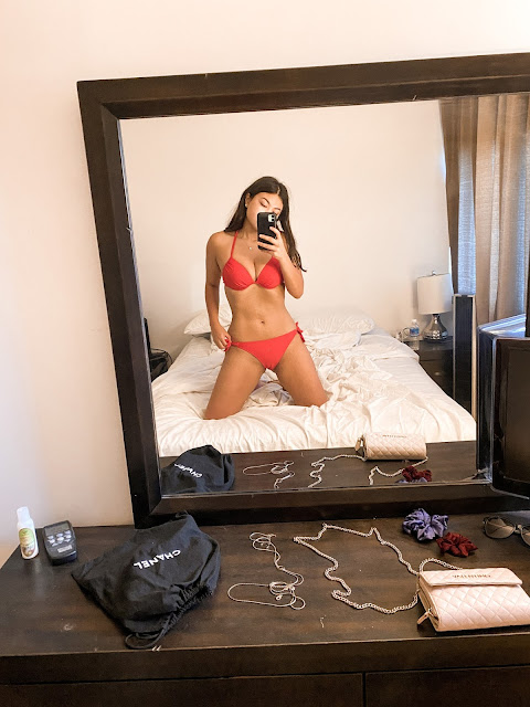 Kelly Fountain wearing a red bikini in Waikiki Oahu Hawaii
