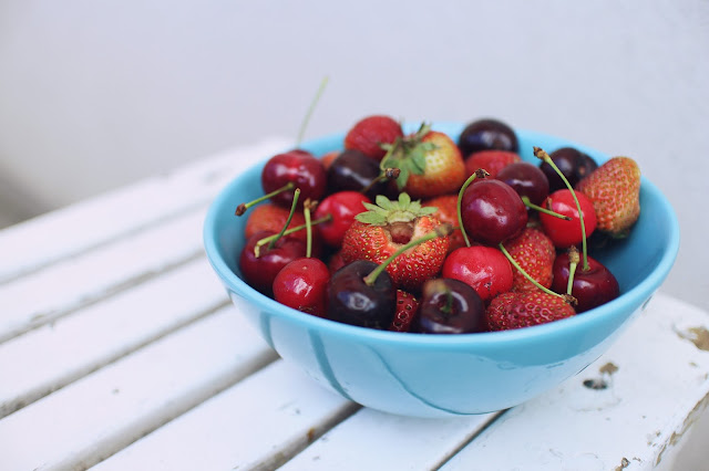 Bowl of cherries and strawberries