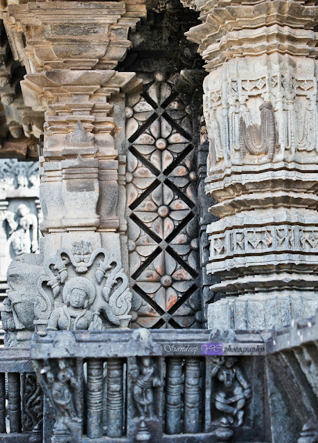 Some kind of beautiful patterns sculptures on the shrines of the temple