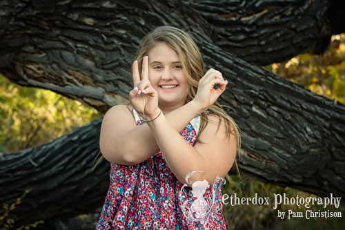 professional portrait of a beautiful high school senior in Corrales