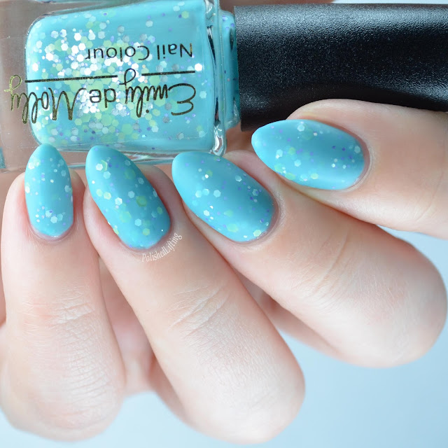 light blue nail polish with glitter with matte top coat