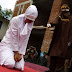 Photos: Indonesian woman caned in public for committing fornication 