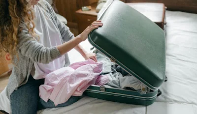girl packing for trip