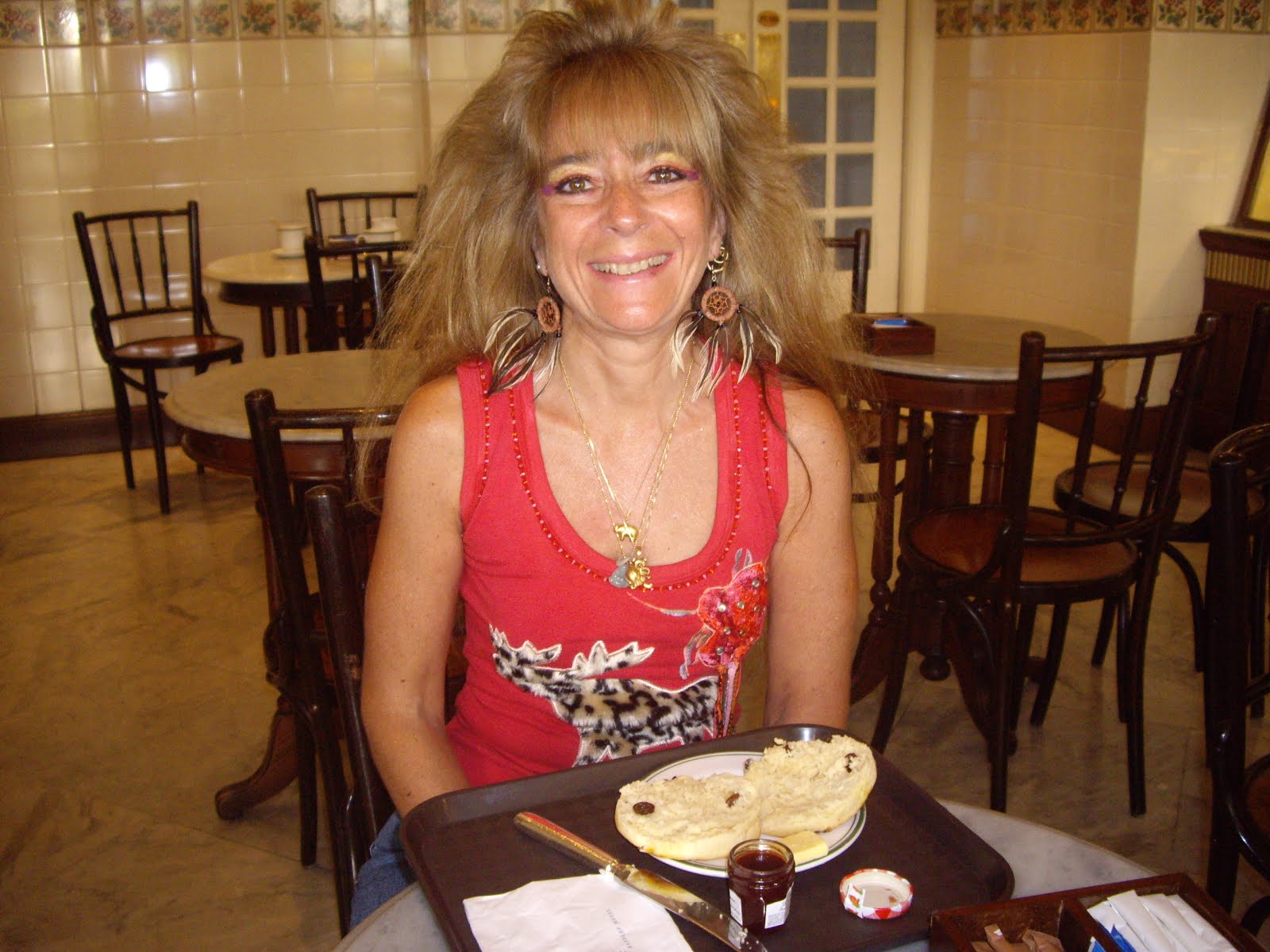 VIVIENNE ENJOYING BREAKFAST SCONES AT RAFFLES HOTEL,SINGAPORE