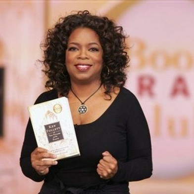 oprah winfrey biography book. same ook and discuss it.