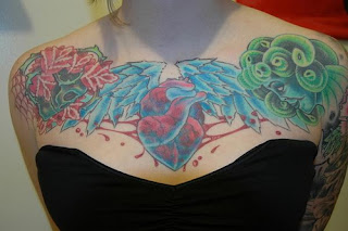 Heart with Wings Chest Piece Tattoo Design