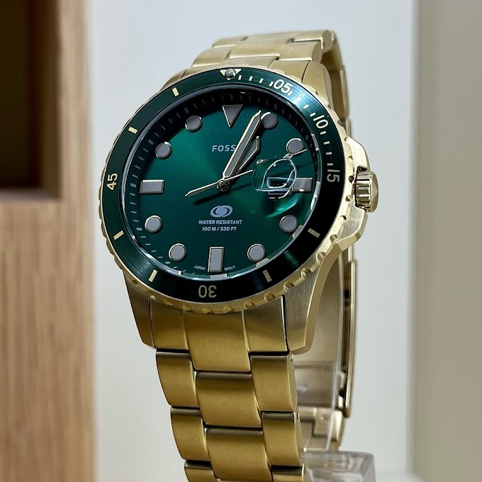 FOSSIL BLUE DIVE THREE-HAND DATE GOLD-TONE STAINLESS STEEL WATCH