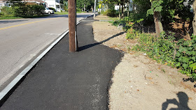 nice work expanding the sidewalk to provide room around the utility pole