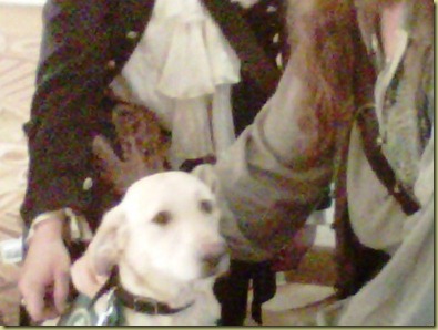 Reyna with a really unsure look on her face with the drunk pirates.