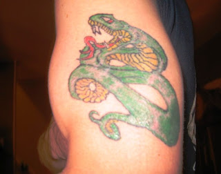 http://allaboutbodyart.blogspot.com/ snake_tattoo_astrology_tattoo_design_arm_tattoos