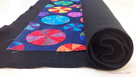 Making a Quilt Sandwich - Rolling Quilt and Wadding onto a tube