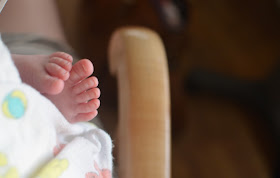 Ten Things I Wish We Knew Before Making our Baby Registry baby feet