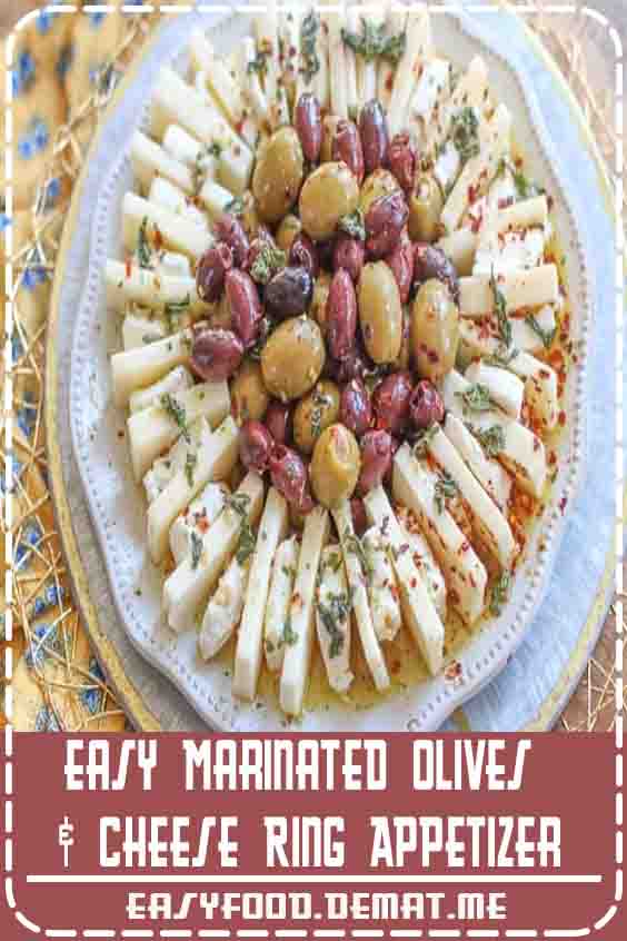 Entertaining doesn't have to be complicated. This easy marinated olives and cheese ring appetizer is beautiful and delicious. It is the perfect appetizer for the holidays, parties, or wine night! Make it for your next special occasion!#Appetizers#Cheese Appetizers#Deep Fried Appetizers