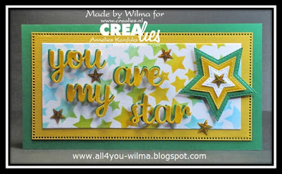 Een slimline-kaart in groen- en geelkarton en wit fluweel-karton met sterren van inkt met aan de rechterzijde, in dezelfde kleuren karton, "grote" sterren. Op deze slimline-kaart staat te lezen: "you are my star". A slimline-card in green and yellow cardstock and white velvet cardstock with ink stars and on the right side, in the same colored cardstock, "big" stars. This slimline card reads: "you are my star".