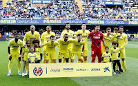 VILLARREAL C. F. Temporada 2021-22. Serge Aurier, Capoue, Danjuma, Raúl Albiol, Pau Torres, Rulli, Giovani Lo Celso, Dani Parejo. Manu Trigueros, Estupiñán, Yérmey Pino. VILLARREAL C. F. 5 R. C. D. ESPANYOL DE BARCELONA 1 Domingo 27/02/2022, 14:00 horas. Campeonato de Liga de 1ª División, jornada 26. Villarreal, Castellón, estadio de La Cerámica: 15.600 espectadores. GOLES: 1-0: 14’,Yéremy Pino. 2-0: 20’, Yéremy Pino. 3-0: 45’, Yéremy Pino. 4-0: 53’, Yéremy Pino. 4-1: 65’, Keidi Baré. 5-1: 86’, Boulaye Dia.