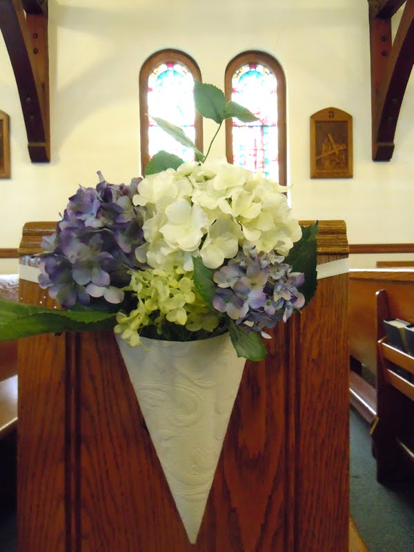 paper cones for pews with silk hydrangeas