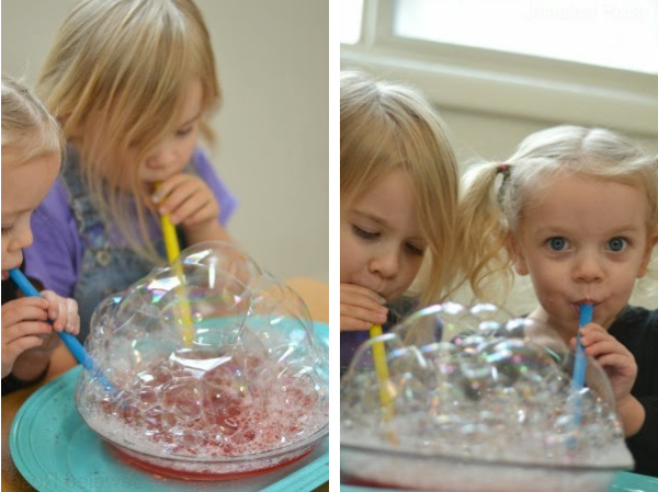 Make bubbles for kids using Kool-aid!  These bubbles are so colorful, making them great for arts, crafts, and sensory play. #koolaidbubbles #scentedbubbles #homemadebubbles #bubblesforkids #bubbles #bubblesrecipe #bubbleart #bubbleactivitiesforkids #bubblepainting #bubbleprints #koolaidrecipes #koolaidhacks #growingajeweledrose