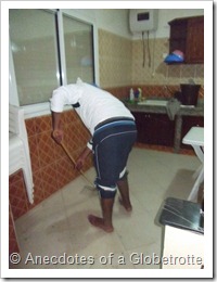 Aziz mopping floor