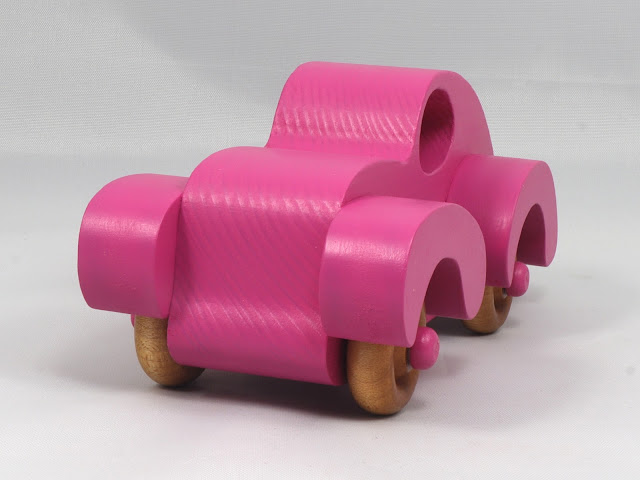 Handmade Wooden Toy Car Finised With Hot Pink Acrylic Paint and Amber Shellac, Fat Fendered Ford Torpedo