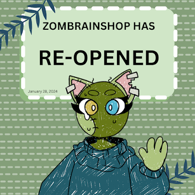In lettering it says ZomBrainShop Has Re-Opened. While a drawing of a Cat Mascot is at the bottom waving.