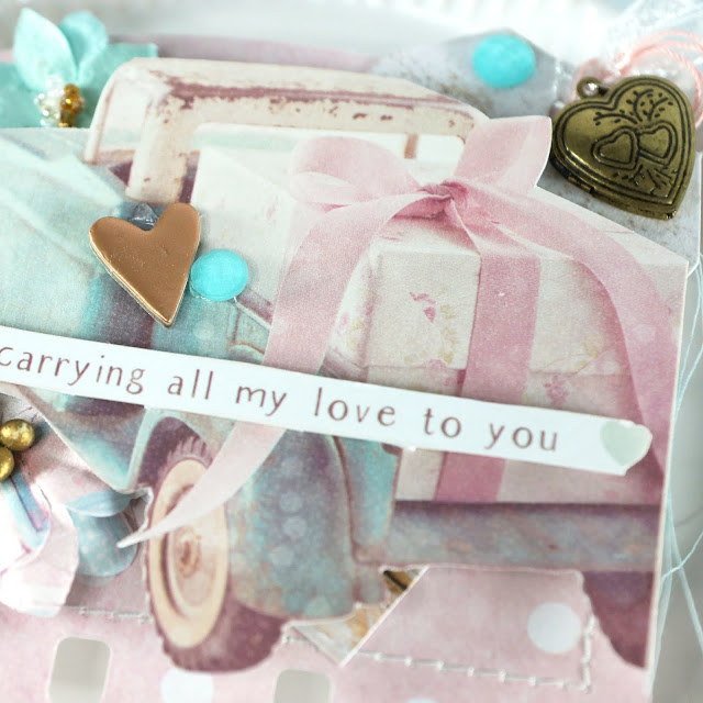 Heidi Swapp Memorydex Valentine's advent calendar made with the Prima With Love collection by Frank Garcia; fussy cut vintage truck with gift tag and die cut card; decorated with ephemera, chipboard stickers, paper flowers, lace trim and locket charm