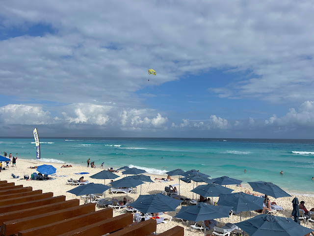 view of beach from pool deck