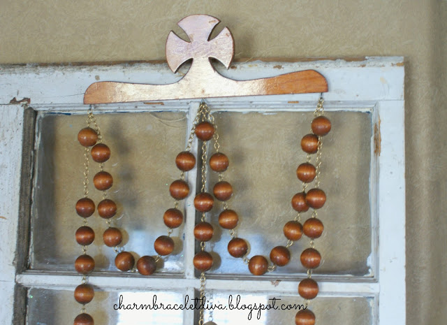 vintage oversized rosary wall art