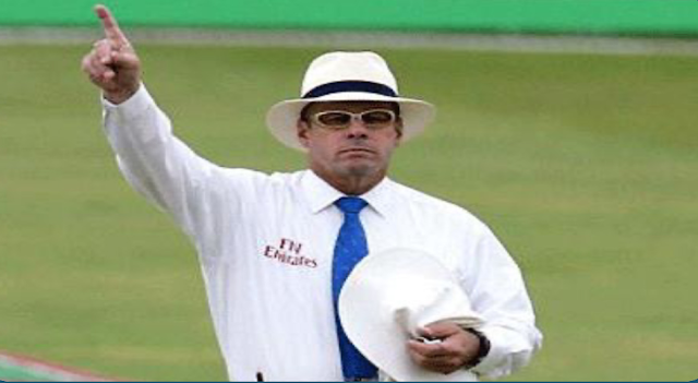 When an umpire raises one arm to the sky, what does it mean?