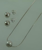 http://www.lojaandreacessorios.com.br/produto-2629-conjunto_donna_bola_310155330034