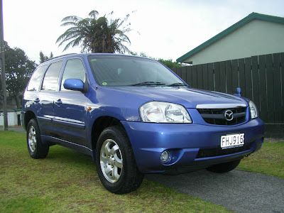 Mazda LX G Package Tribute Model