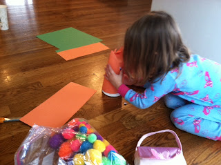 little kids doing crafts with recycled products