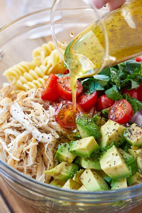 Healthy Chicken Pasta Salad – Packed with flavor, protein and veggies! This healthy chicken pasta salad is loaded with tomatoes, avocado, and fresh basil. If you’re looking for a nutrit…