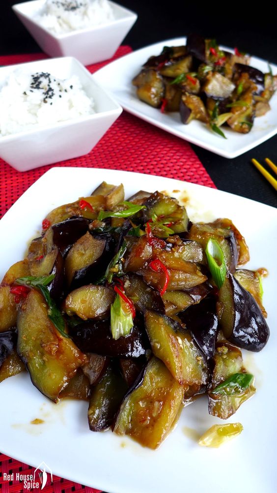Creamy and luscious, stir-fried aubergine in plum sauce is a dish to die for. This recipe tells you how to achieve the desired texture using a minimum of oil.