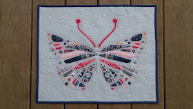 Reverse applique butterfly mini quilt