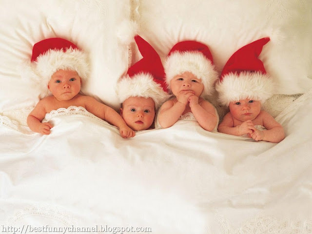 Four funny Christmas babies.