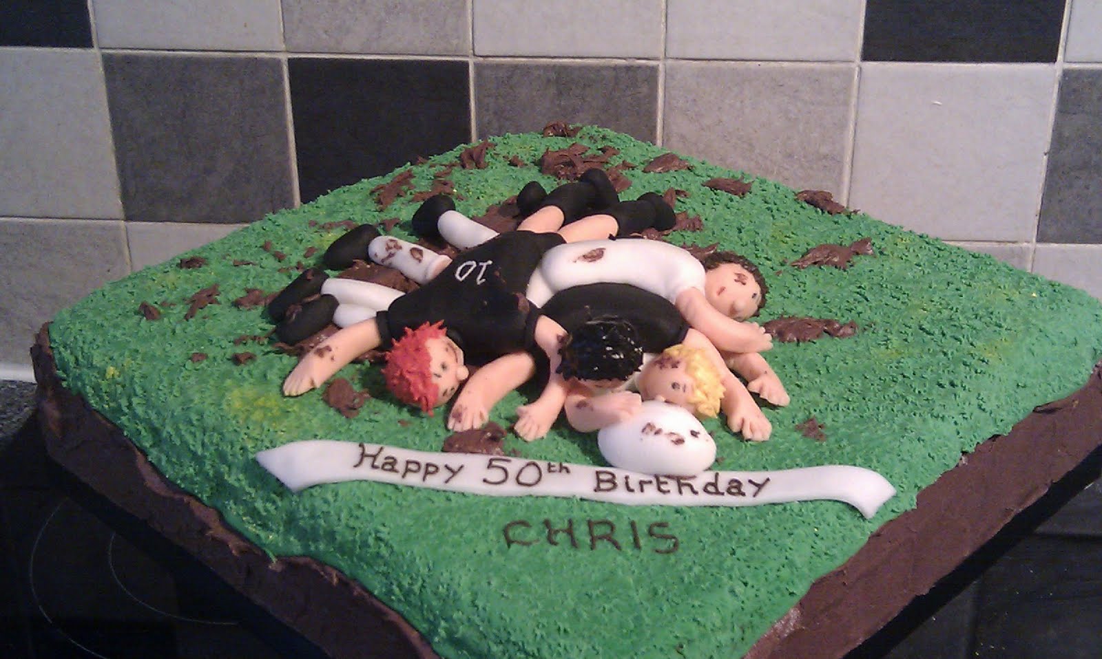 ... the rugby tackle cake this time with england and new zealand players
