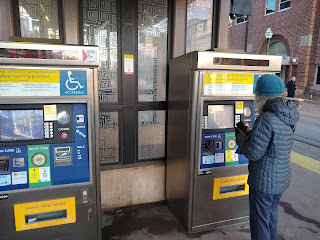 Fare kiosks by the train stop